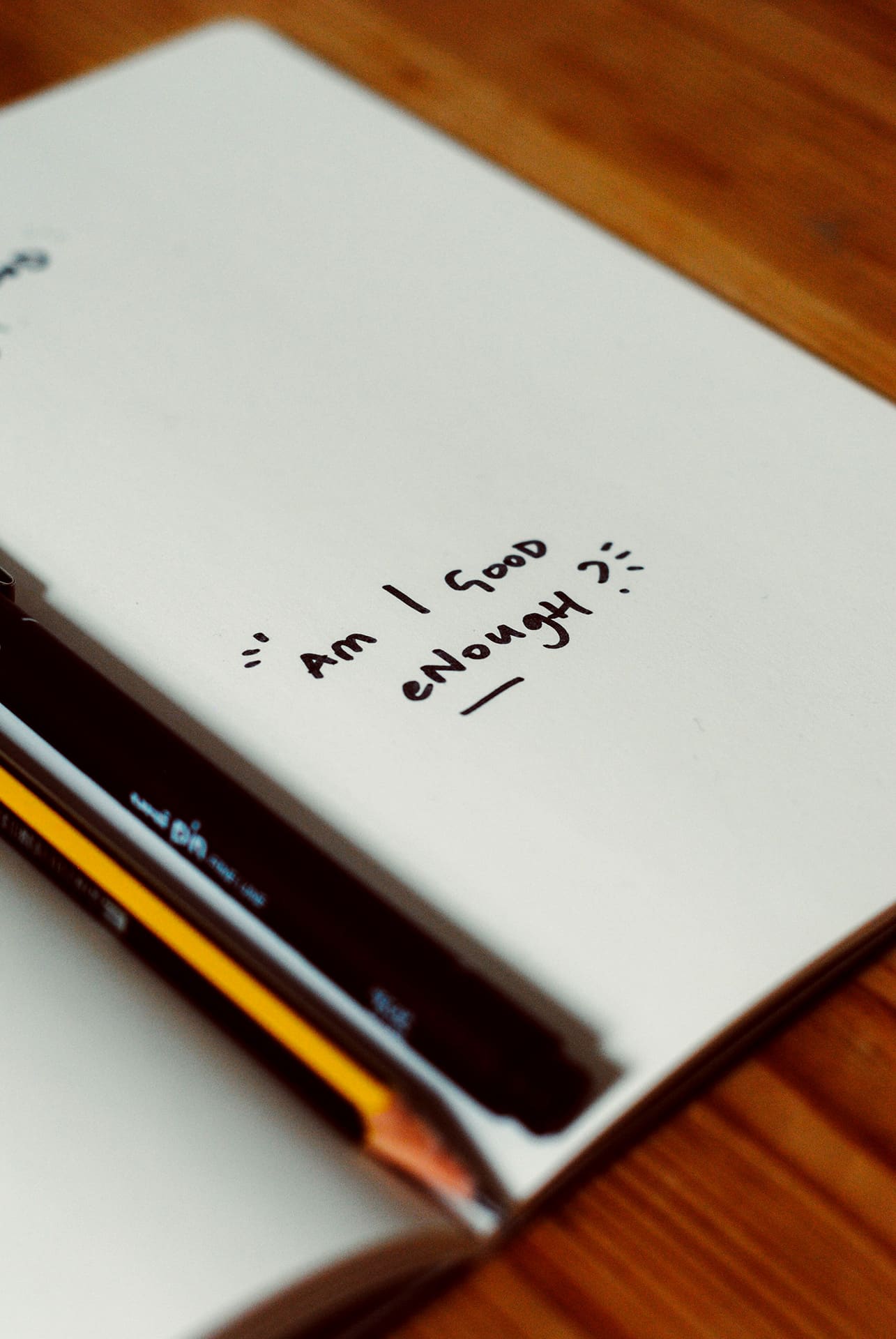 notebook with pencils